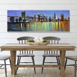 Canvas 20 x 60 - Colorful city with a bridge by night