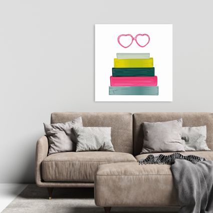 Lunettes en forme de cœur et livres