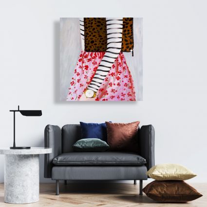 Fashionable woman with a leopard bag