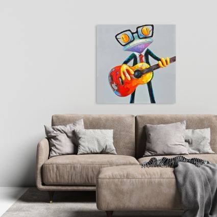 Funny frog playing guitar