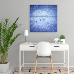 Canvas 24 x 24 - Birds on a wire with a clear blue sky