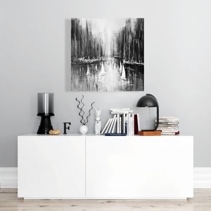 Grayscale boats on the water
