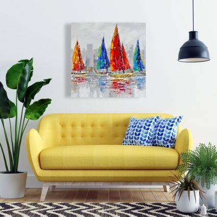 Colorful boats near a gray city