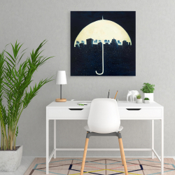 Canvas 24 x 24 - A city under a umbrellas