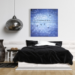 Canvas 36 x 36 - Birds on a wire with a clear blue sky