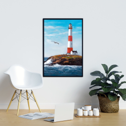 Framed 24 x 36 - Lighthouse at the edge of the sea