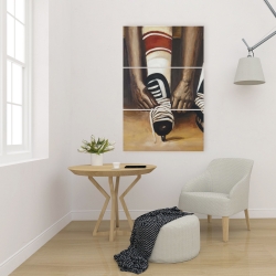 Canvas 24 x 36 - Hockey player ties his skates