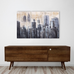 Toile 24 x 36 - Immeubles au travers des nuages