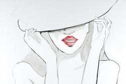Femme avec grand chapeau