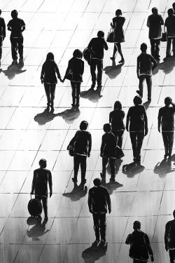 Silhouettes of people on the street
