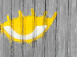Yellow eye graffiti on a container