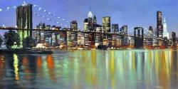 Colorful city with a bridge by night