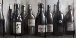 Bouteilles de vin sur bois