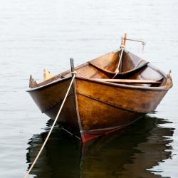 Rowboat on calm water