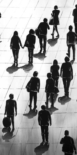 Silhouettes of people on the street
