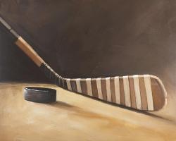 Stick and hockey puck