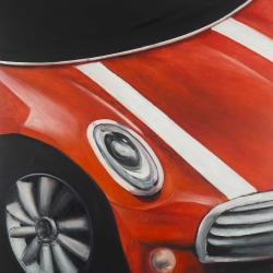 Red car with white stripes closeup
