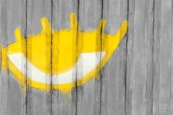 Yellow eye graffiti on a container