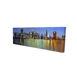Colorful city with a bridge by night