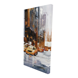 Big city street with yellow taxi