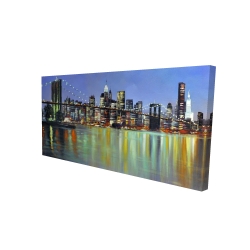 Colorful city with a bridge by night