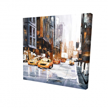 Big city street with yellow taxi