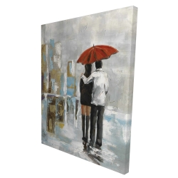 Couple walking under their umbrella