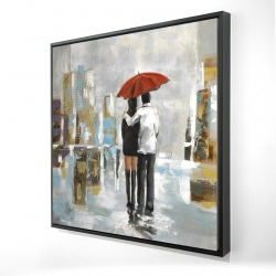 Couple walking under their umbrella