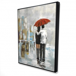Couple walking under their umbrella