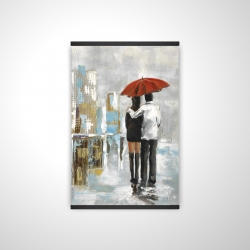 Couple walking under their umbrella